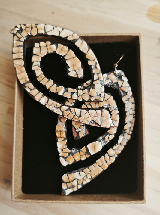 Boucles spirales en coquille d'oeuf