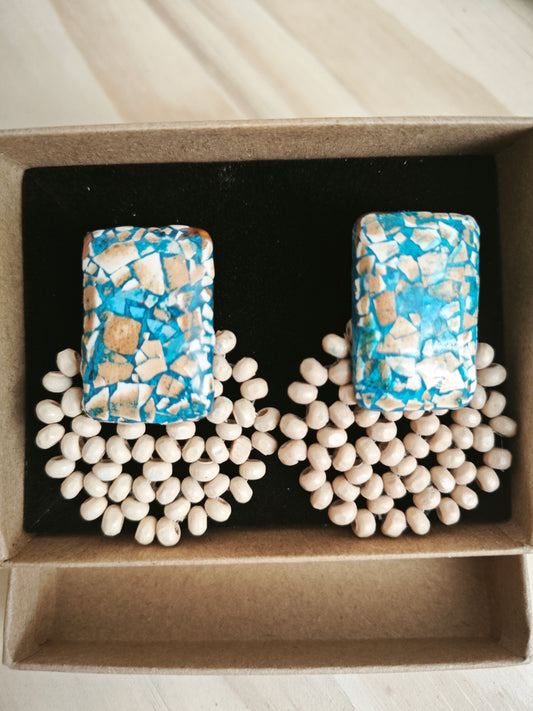 Boucles tissage et coquille d'oeuf bleue